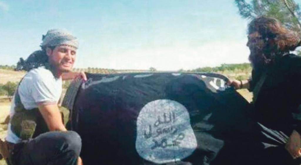 Abdul sa zastavom ISIS