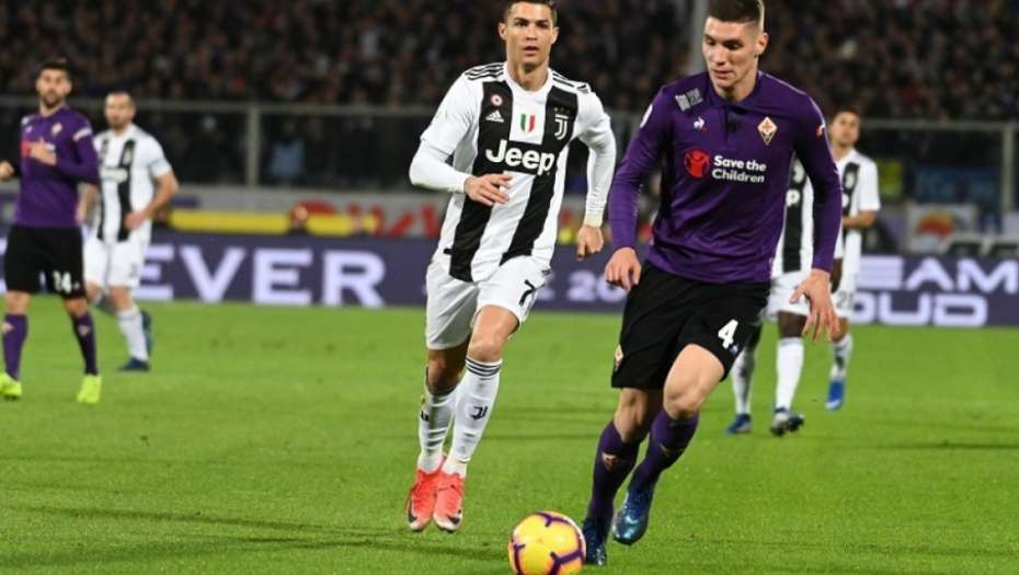 Nikola Milenković u duelu sa Kristijanom Ronaldom