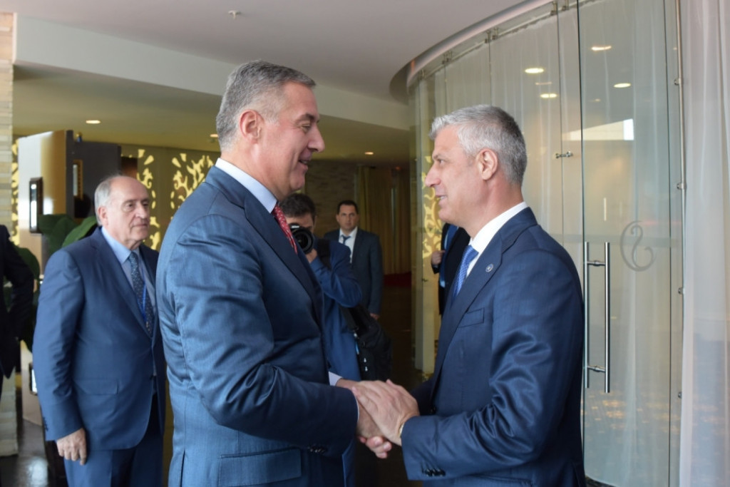 Milo Đukanović, Hašim Tači