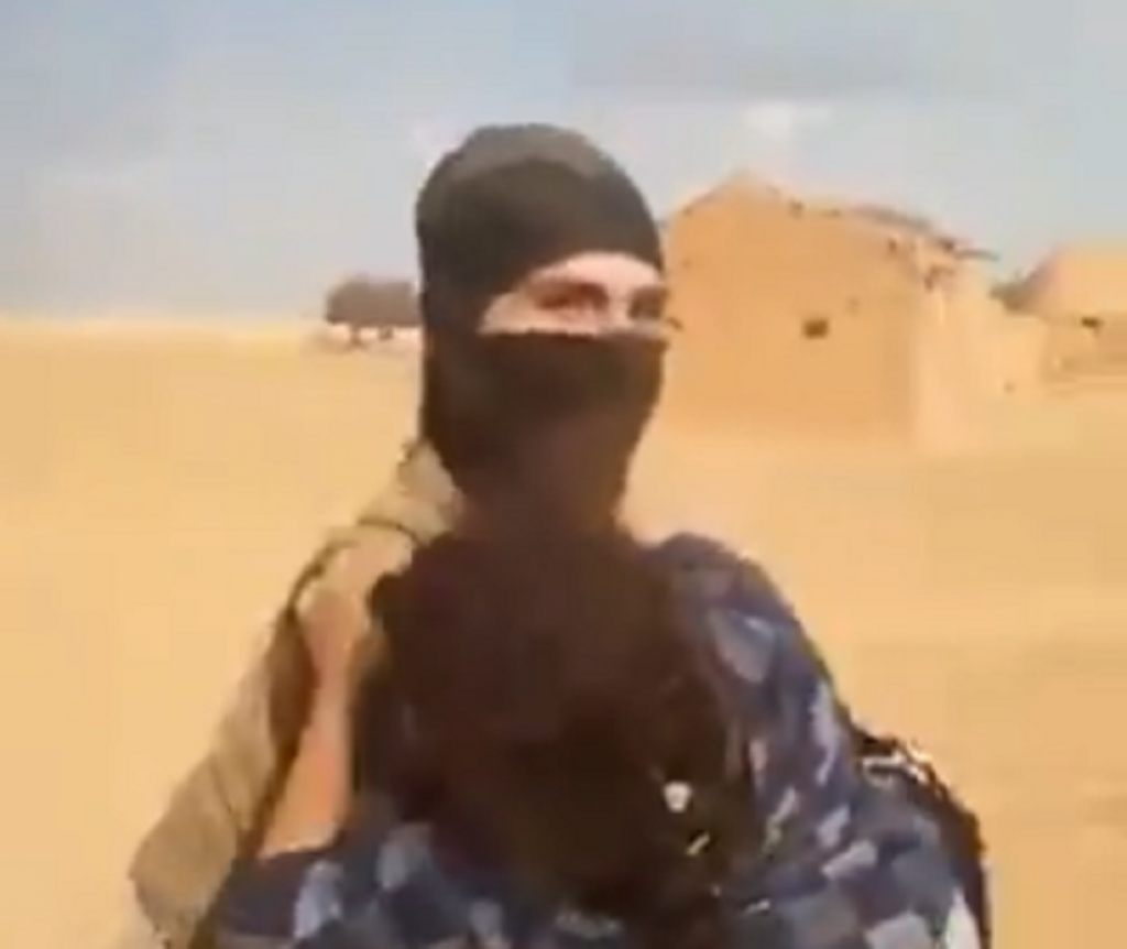 Džihadista nosi kurdsku devojku na klanje