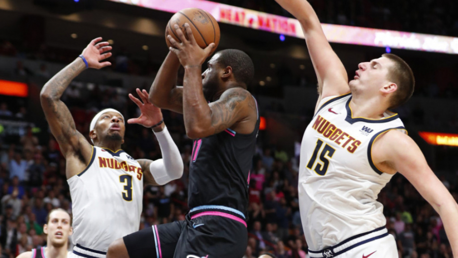 Tori Krejg i Nikola Jokić