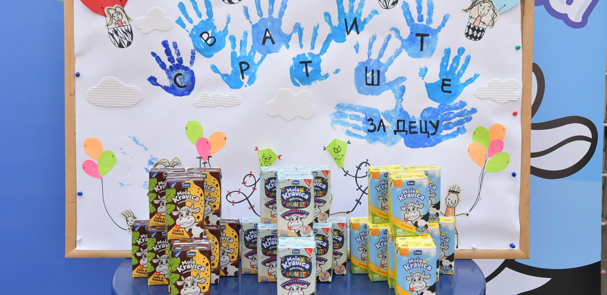 KOMPANIJA IMLEK OBELEŽILA SVETSKI DAN MLEKA Tradicionalna donacija Moja Kravica paketića za nezbrinutu decu