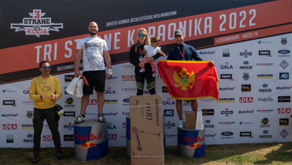TRI STRANE KOPAONIKA PO DEVETI PUT NA NAŠOJ PLANINSKOJ LEPOTICI Domaći takmičari Jana Jolović i Srećko Đolić trijumfovali na biciklističkom maratonu