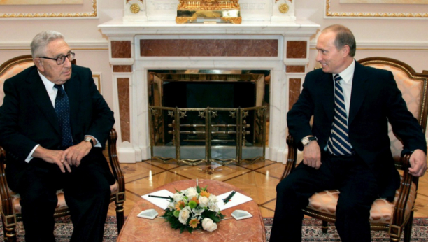 Vladimir Putin i Henri Kisindžer