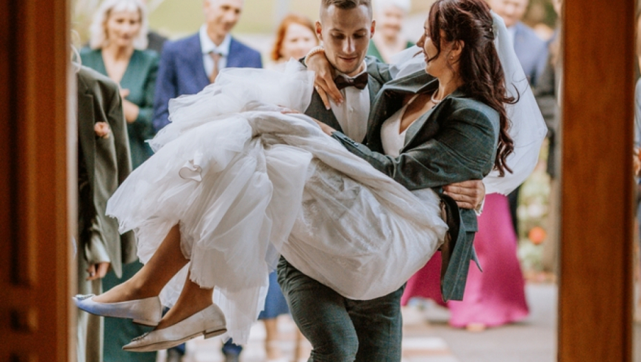 carrying the bride over the threshold
