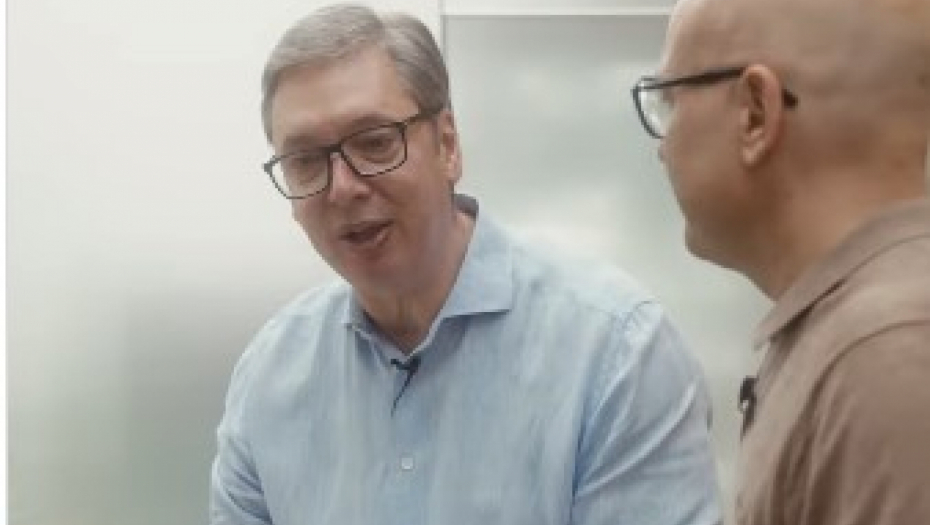 Miloš Vučević i aleksandar Vučić prave sendviče