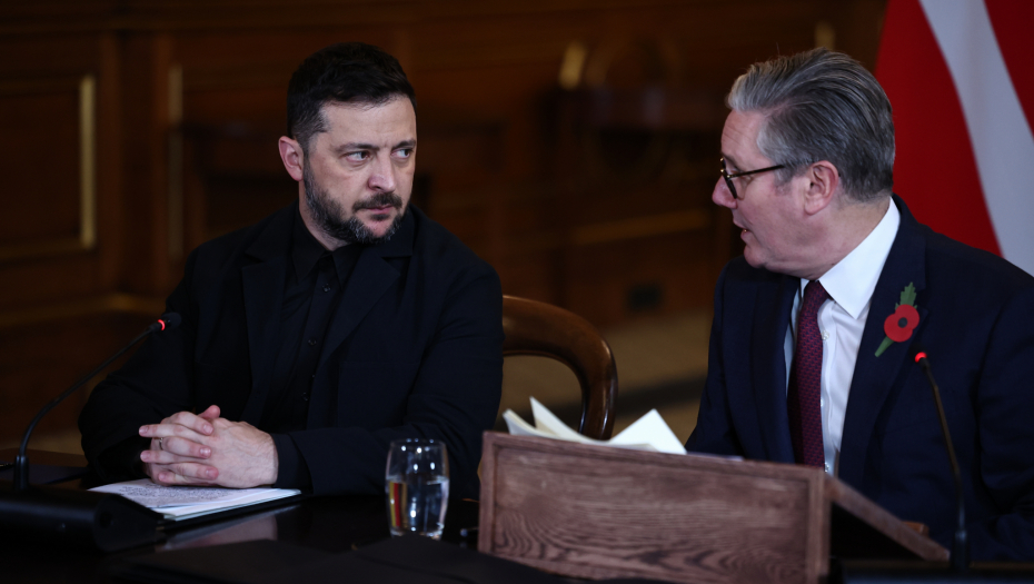 Henry Nicholls/Pool Photo via AP