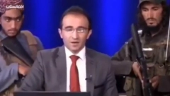 ŠOKANTAN SNIMAK SA TELEVIZIJE U KABULU Talibani sa puškama oko voditelja, a on poručuje ljudima samo ovo!(VIDEO)