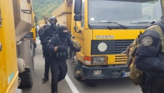 ALBANSKI SNAJPERISTA NIŠANI SRBE Smena pripadnika ROSU na prelazu Jarinje (FOTO)