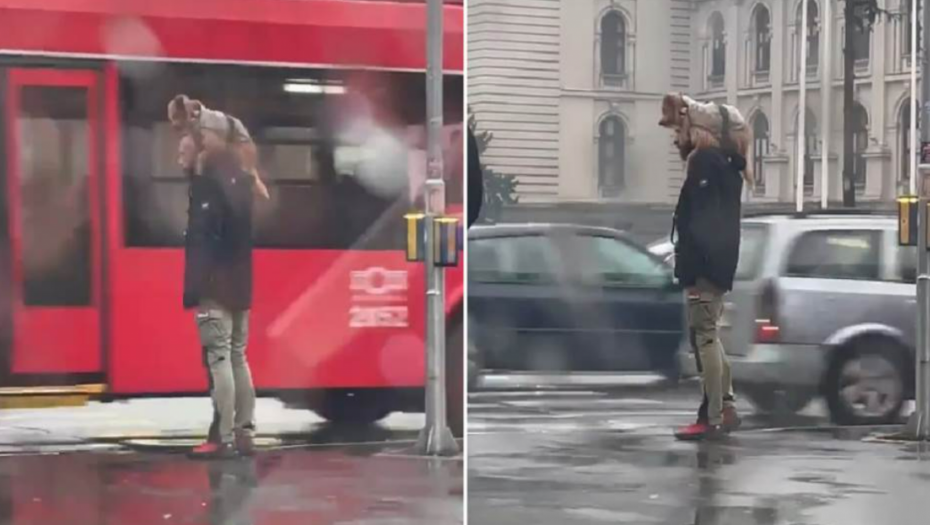 PRELEPA SCENA U CENTRU BEOGRADA Muškarac sačuvao krznenog prijatelja od kiše (VIDEO)