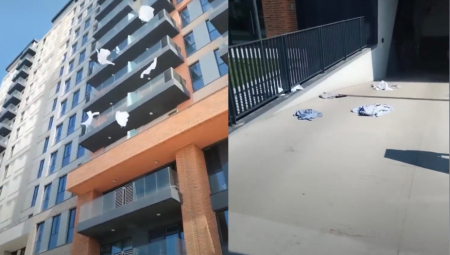 "BACI NJEGA, NEMOJ STVARI" Lete muške košulje i majice sa zgrade u Beogradu na vodi, prolaznici u šoku!