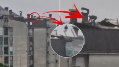 JEZIV SNIMAK IZ KRAGUJEVCA! Muškarac se popeo na sims zgrade dok nevreme razara sve oko njega