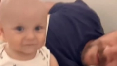 TATA ZAHRKAO, BEBI SE SLEDILA KRV U ŽILAMA Reakcija mališana napravila buru na mrežama! (VIDEO)